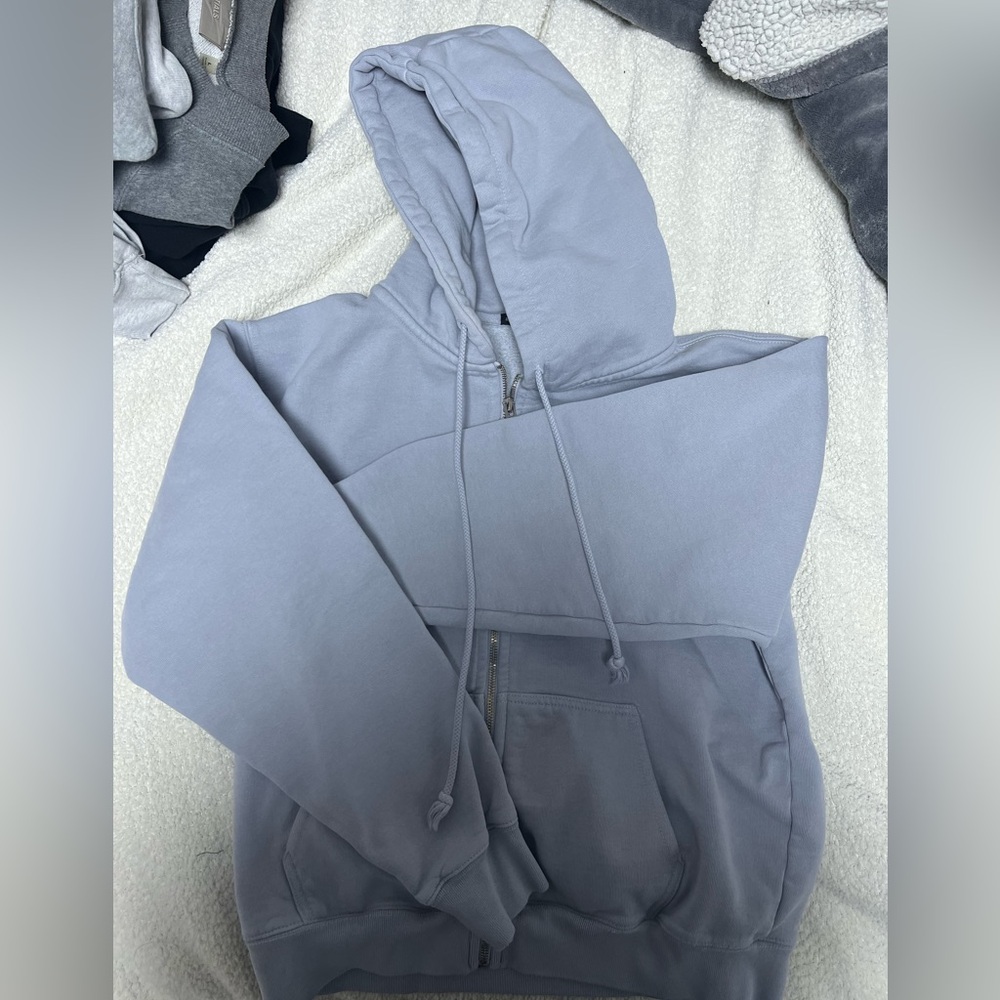 Brandy Melville Christy zip-up Hoodie in light Blue.